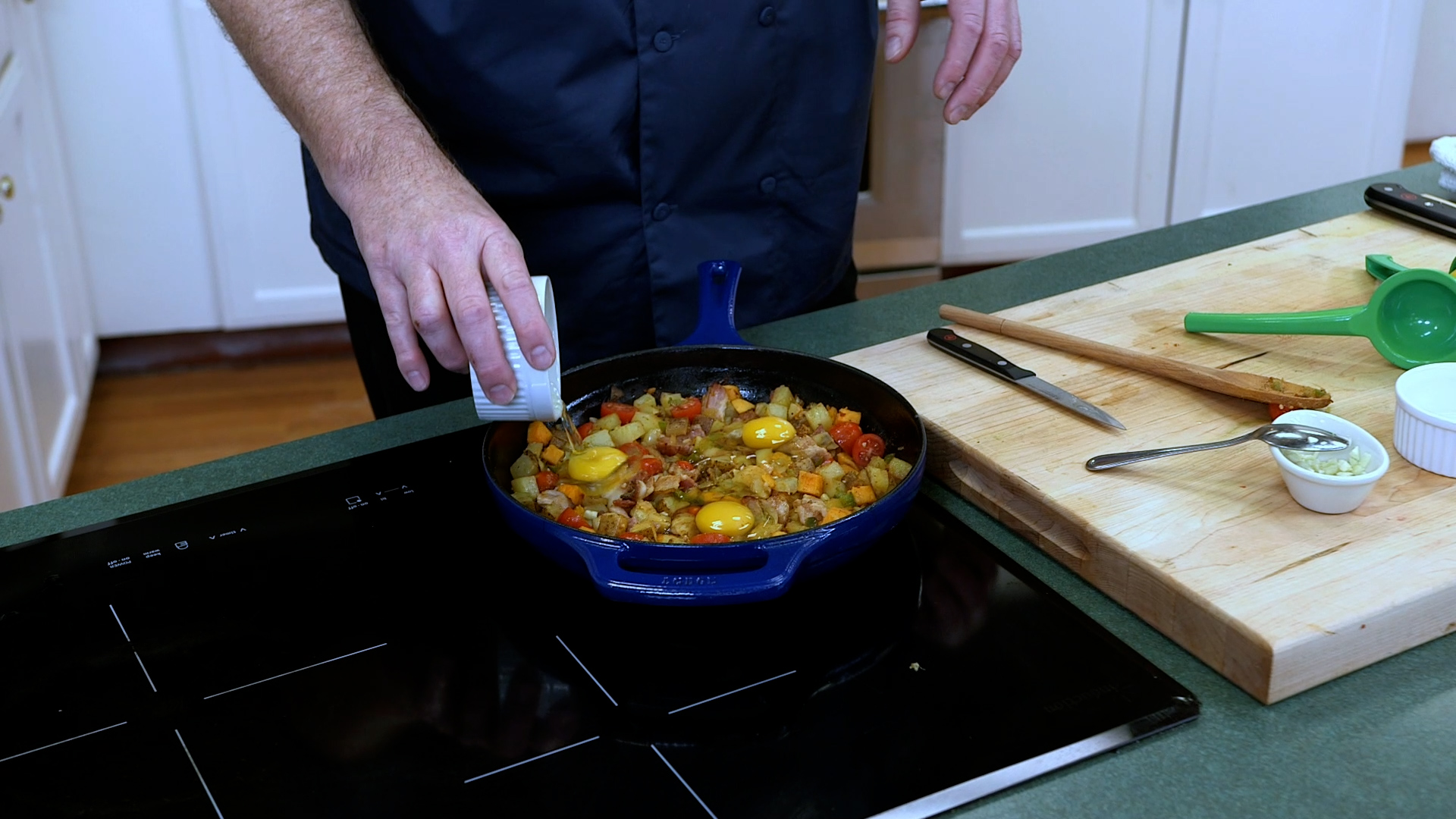 skillet hash eggs in each well