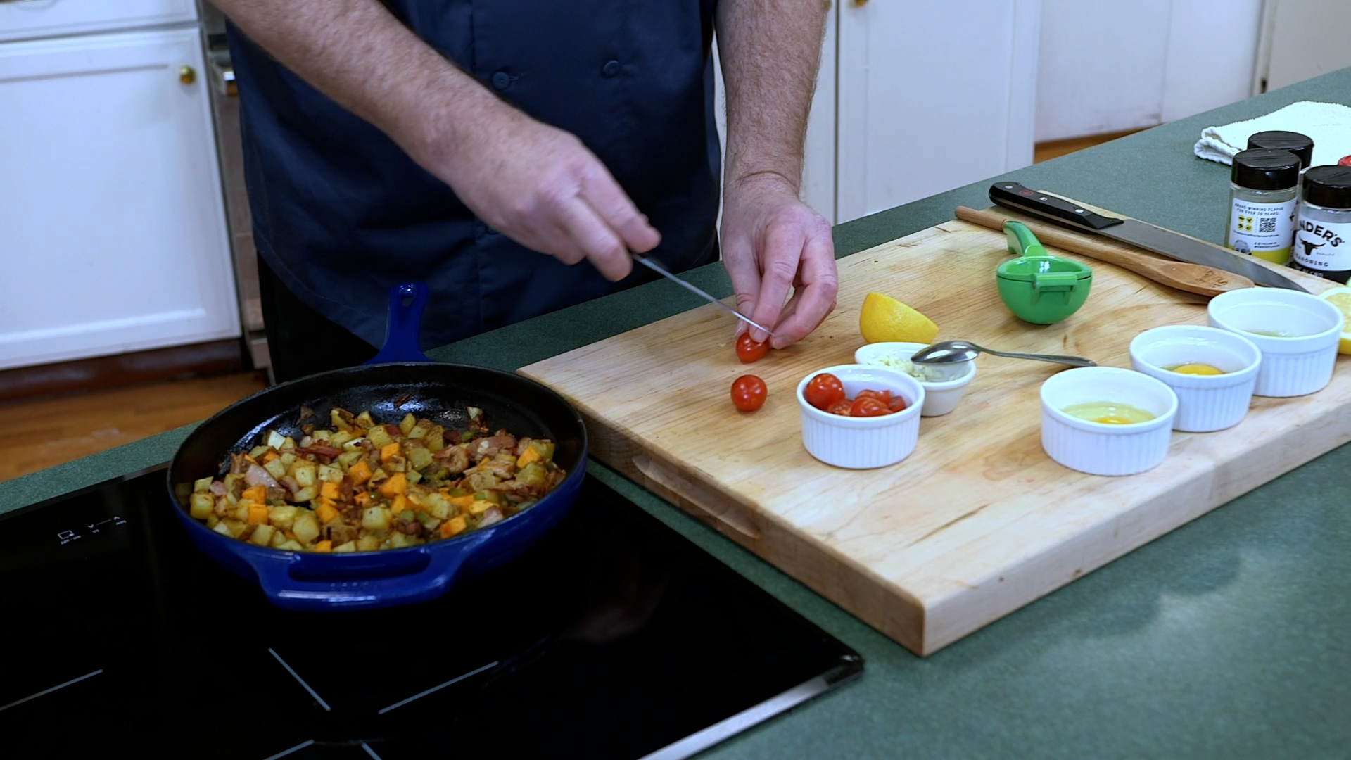 skillet hash halved tomatoes, garlic and lemon juice in the pan