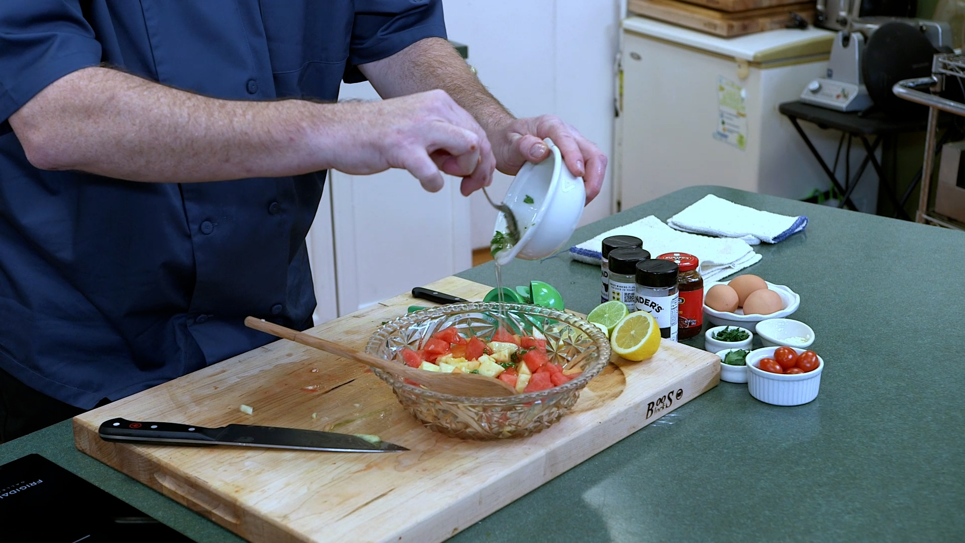 adding simple syrup to melon mixture